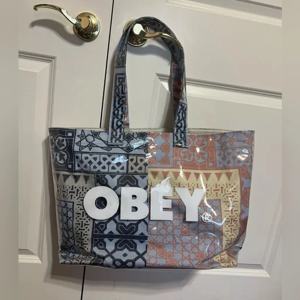 Obey Shepard Fairey Tribal Tote Bag in blue, yellow, and orange